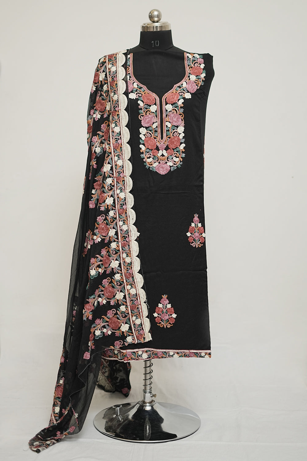 Black colour aari work salwar kameez with neckline pattern